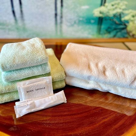 バーベキューもできる! 海と浜比嘉大橋を一望できる宿 Henza Eksteriør billede