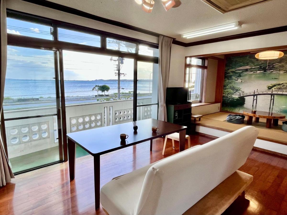 バーベキューもできる! 海と浜比嘉大橋を一望できる宿 Henza Eksteriør billede